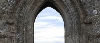 Stone archway with a horizon and sea view point